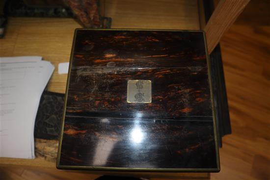 A Victorian coromandel four bottle decanter box